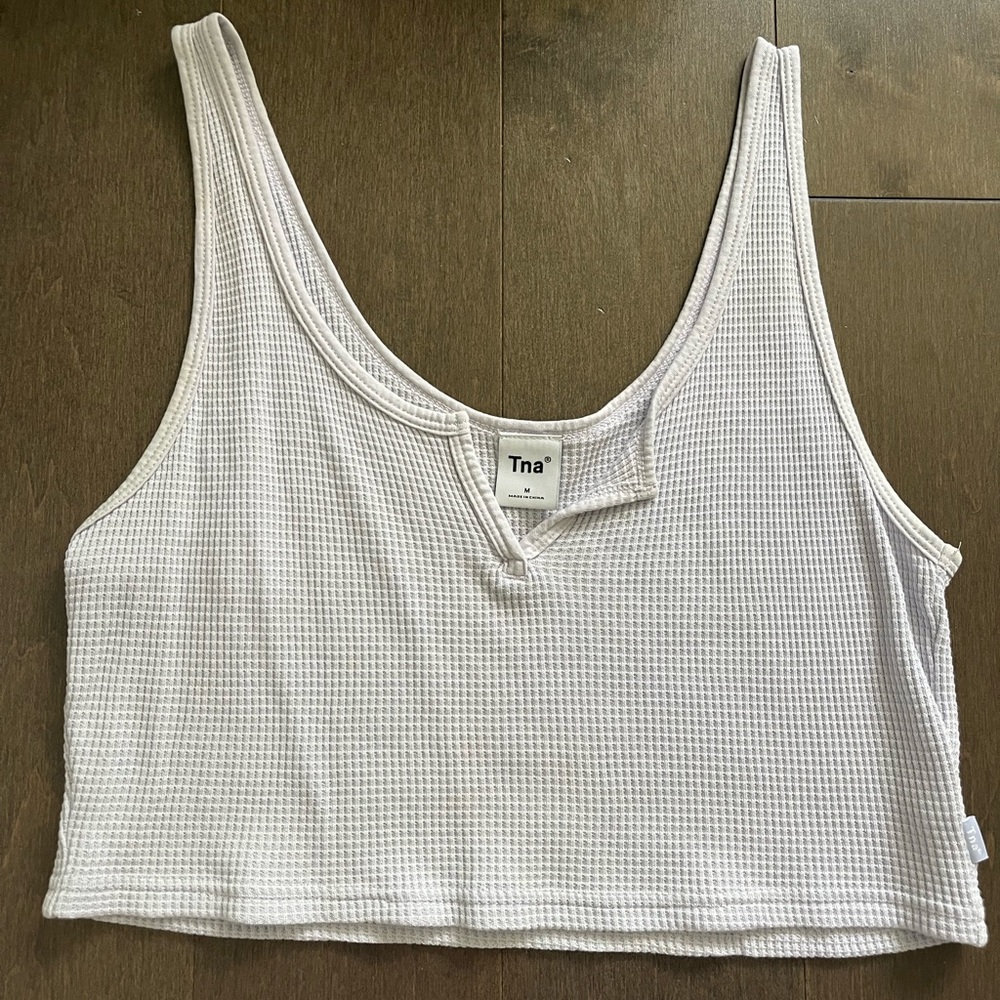 Aritzia top. Waffle fabric. color is in between a light blue and a purple.